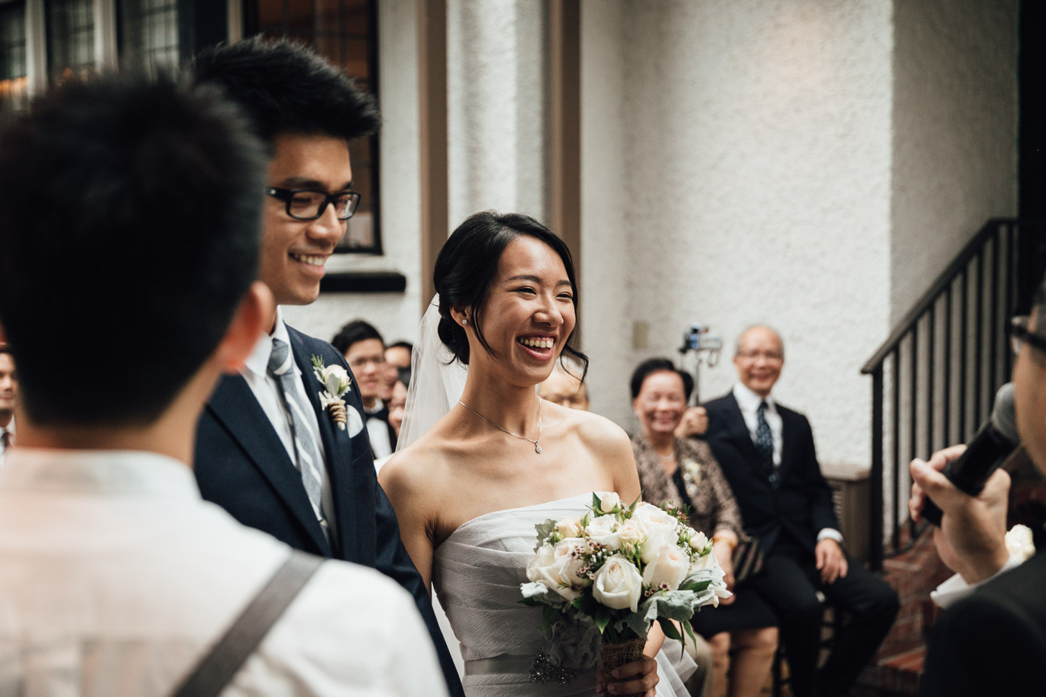 Bride laughing at brockhouse restaurant in vancouver wedding bc