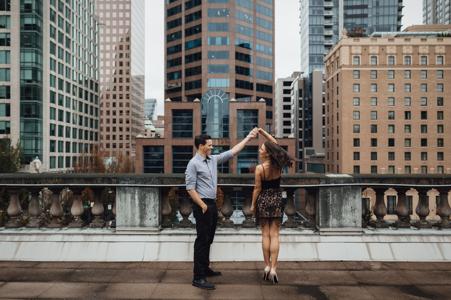 vancouver art gallery downtown engagement photography bc candid twirl rooftop
