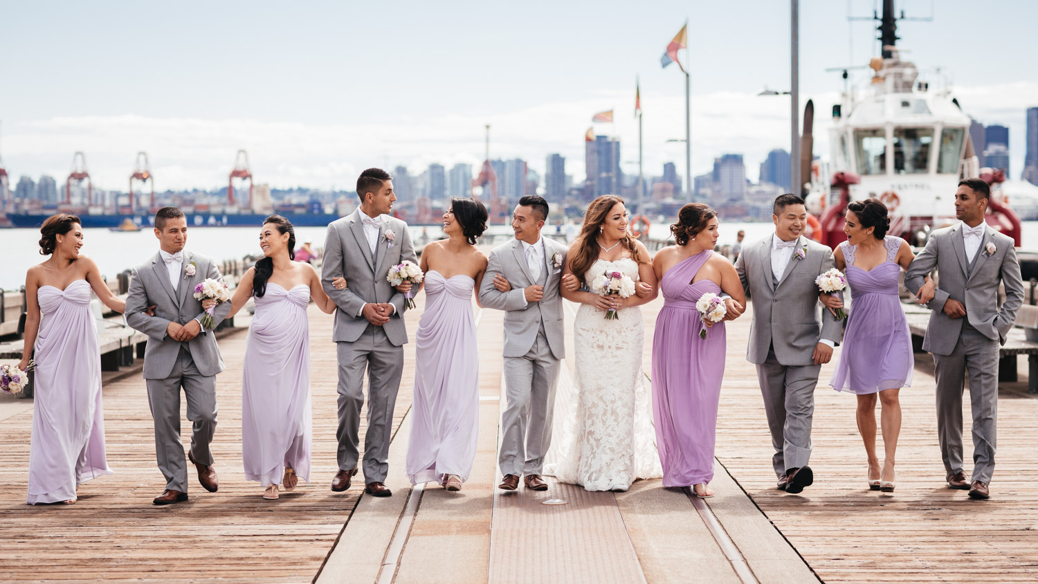 bridal party candid at burrard dry dock in North Vancouver BC wedding