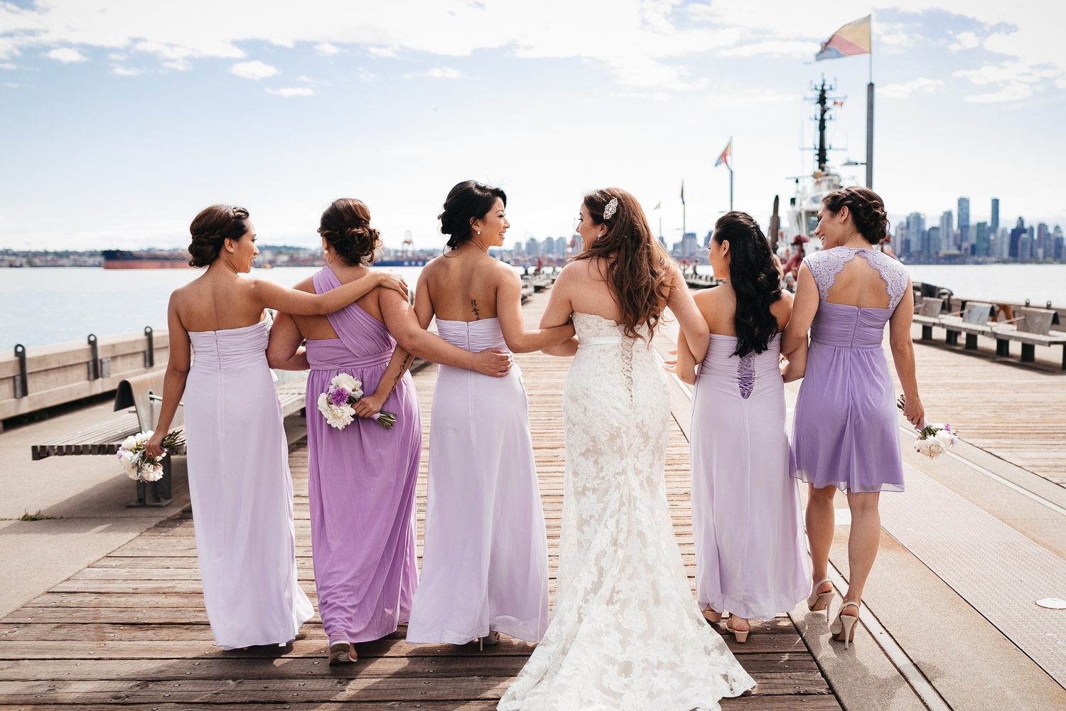bridesmaids in north vancouver wedding photography at burrard dry dock pier