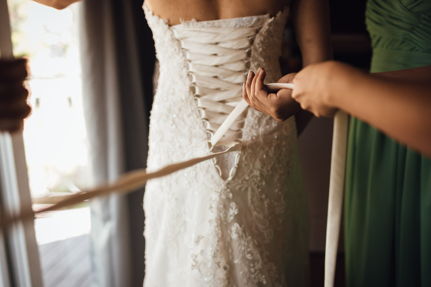 tying wedding dress vancouver wedding photography vancouver bc