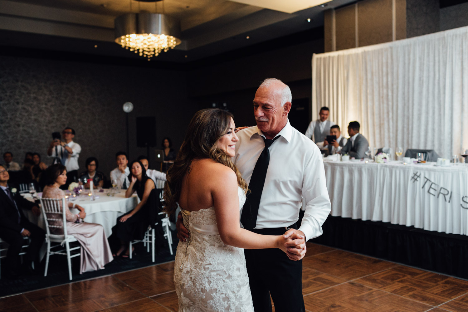 father daughter dance wedding reception at pinnacle at the pier hotel photography in north vancouver