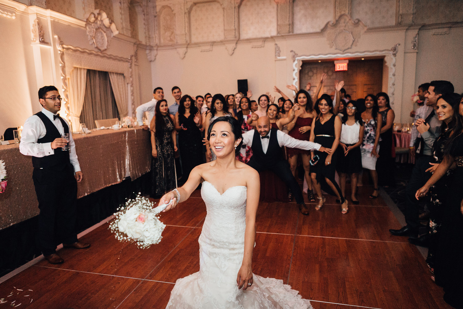 rosewood hotel georgia wedding reception photography bouquet toss in vancouver bc