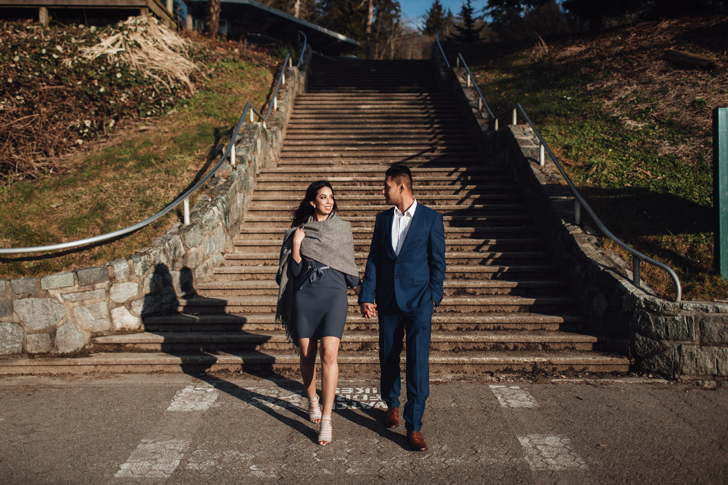 vancouver engagement photography in stanley park candid walking sunset