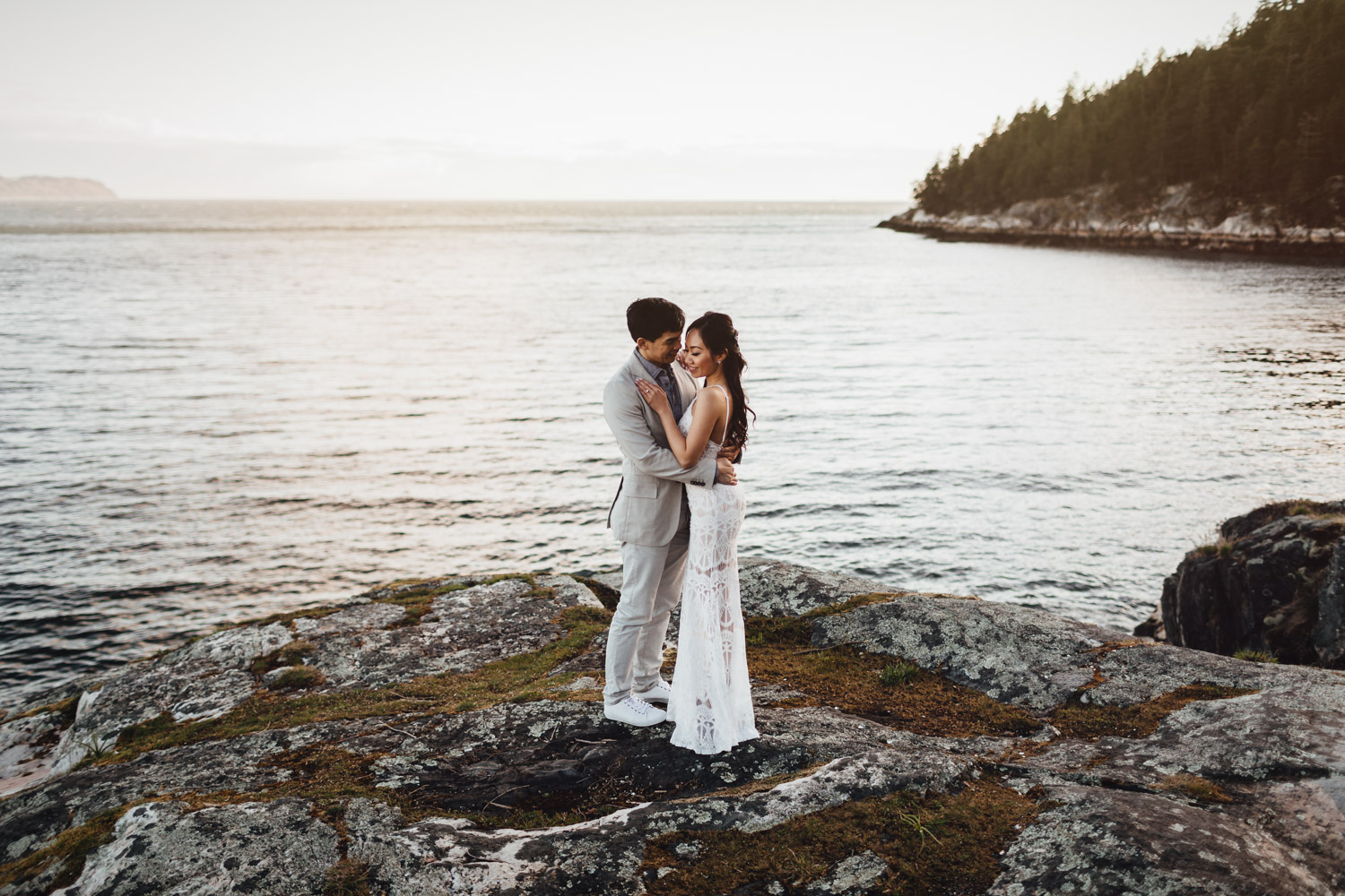 west vancouver engagement photography rocks water and sunset during golden hour