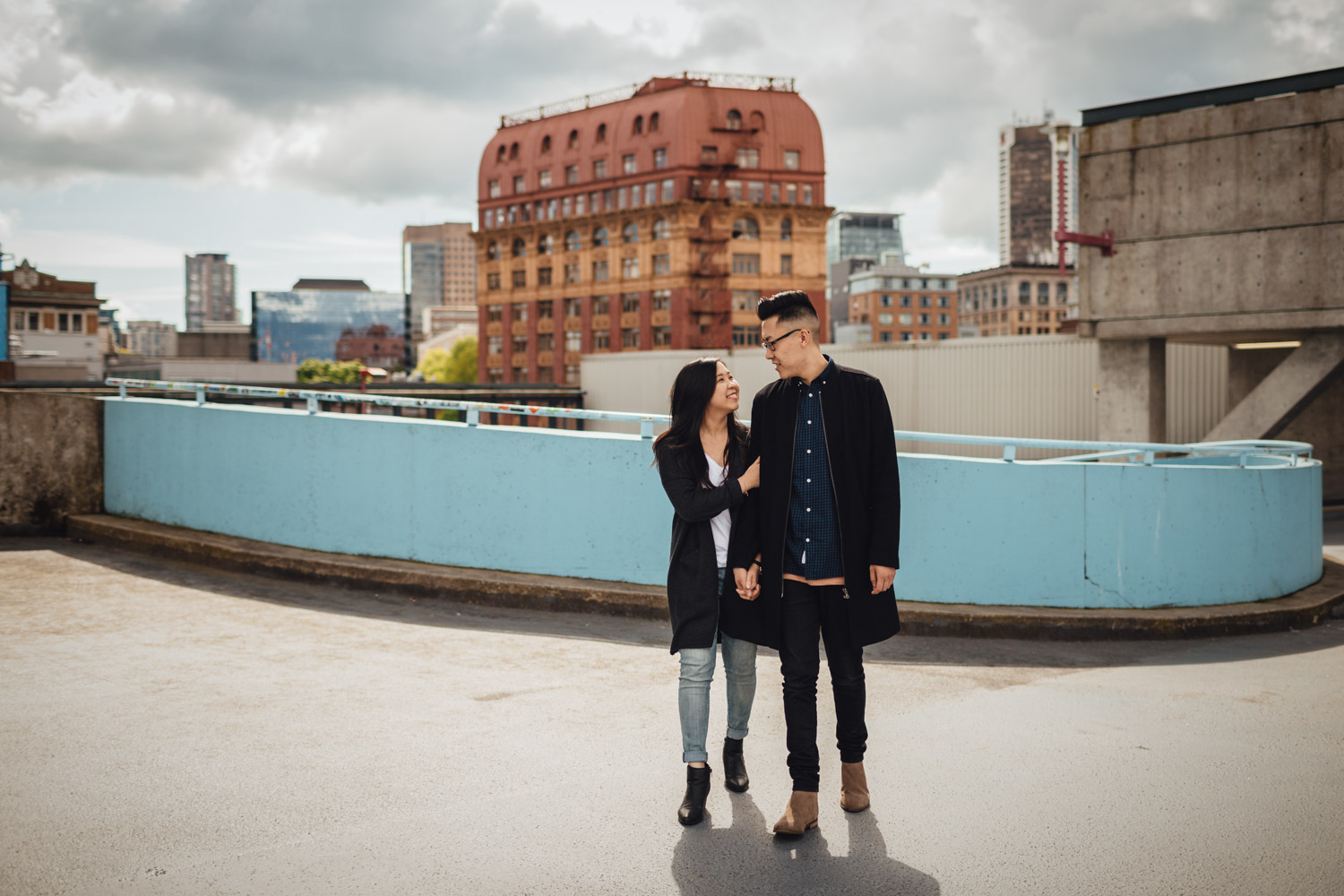gastown candid walking rooftop parkade engagement photography in vancouver bc