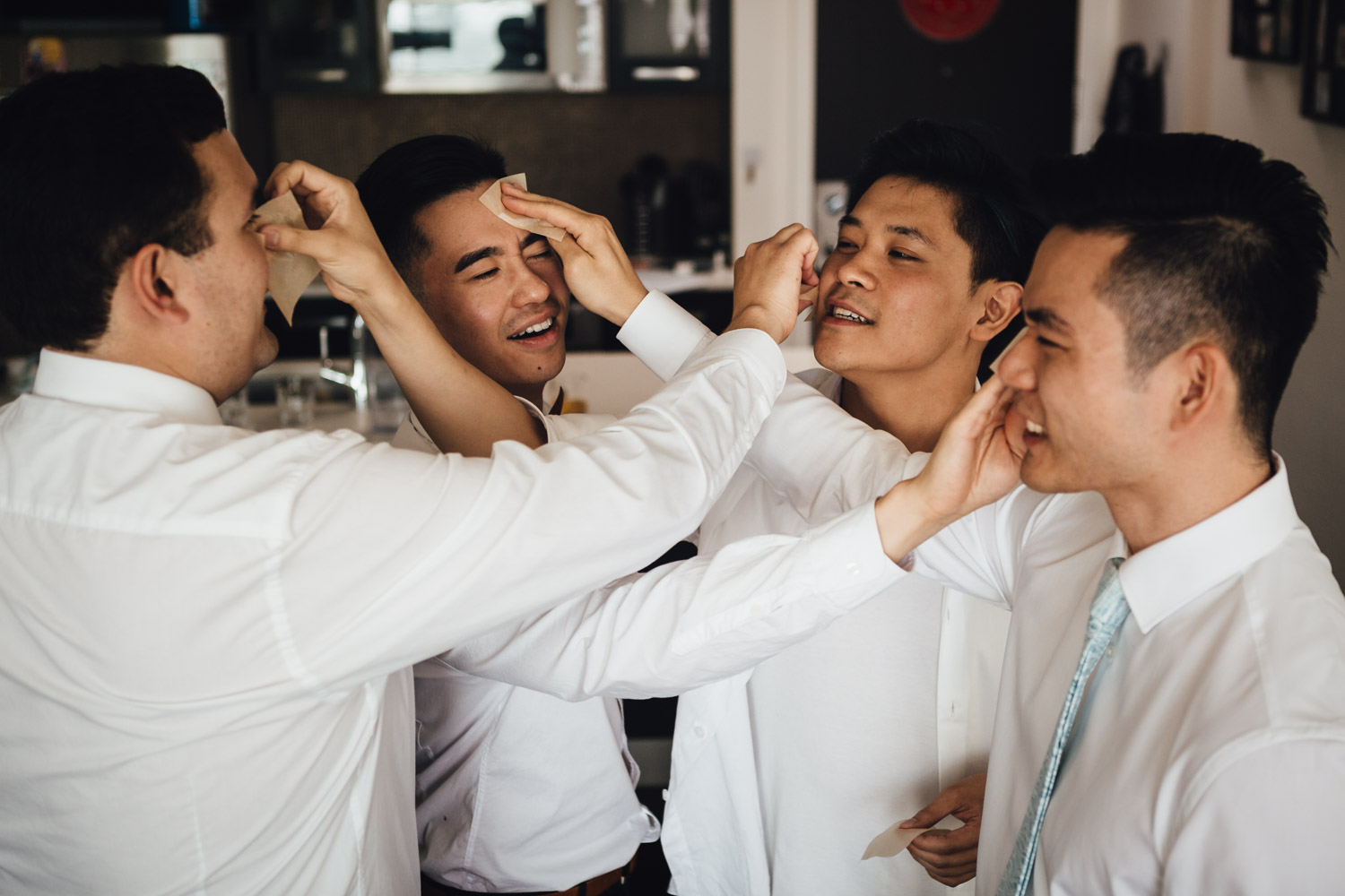 groom and groomsmen candid fun wedding vancouver photography