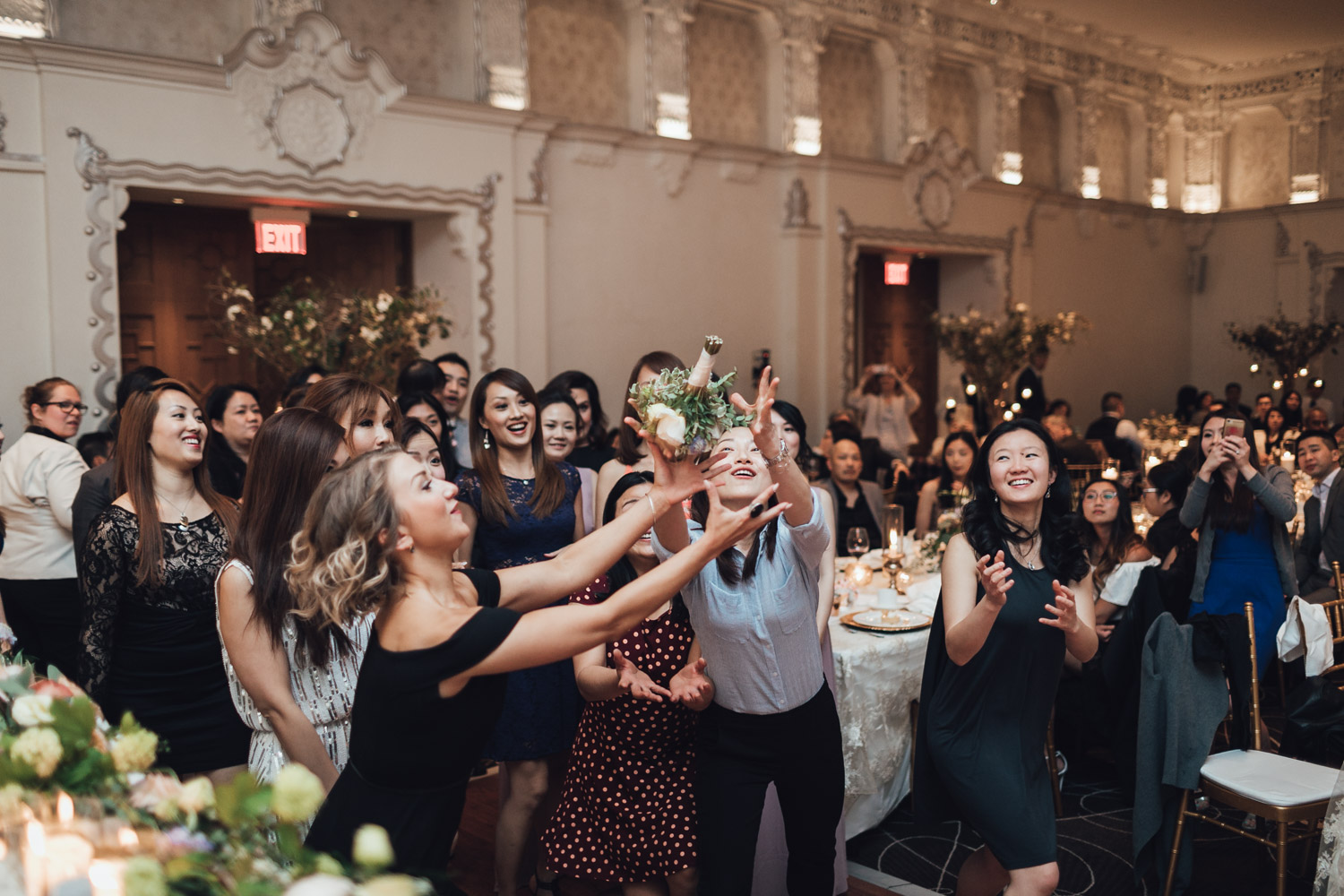 rosewood hotel georgia spanish ballroom wedding reception photography vancouver bouquet toss