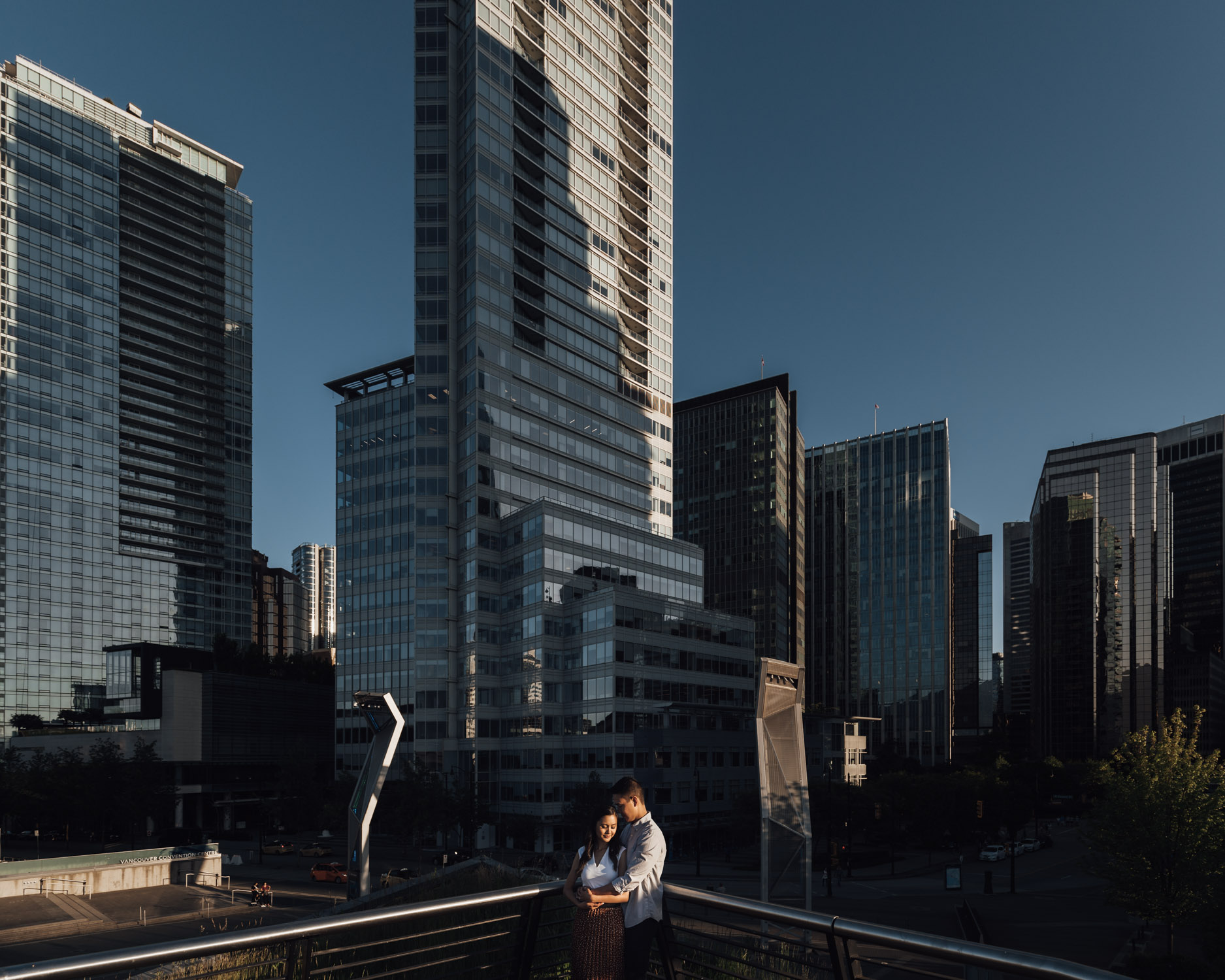 coal harbour engagement photography in vancouver bc during sunset marine building