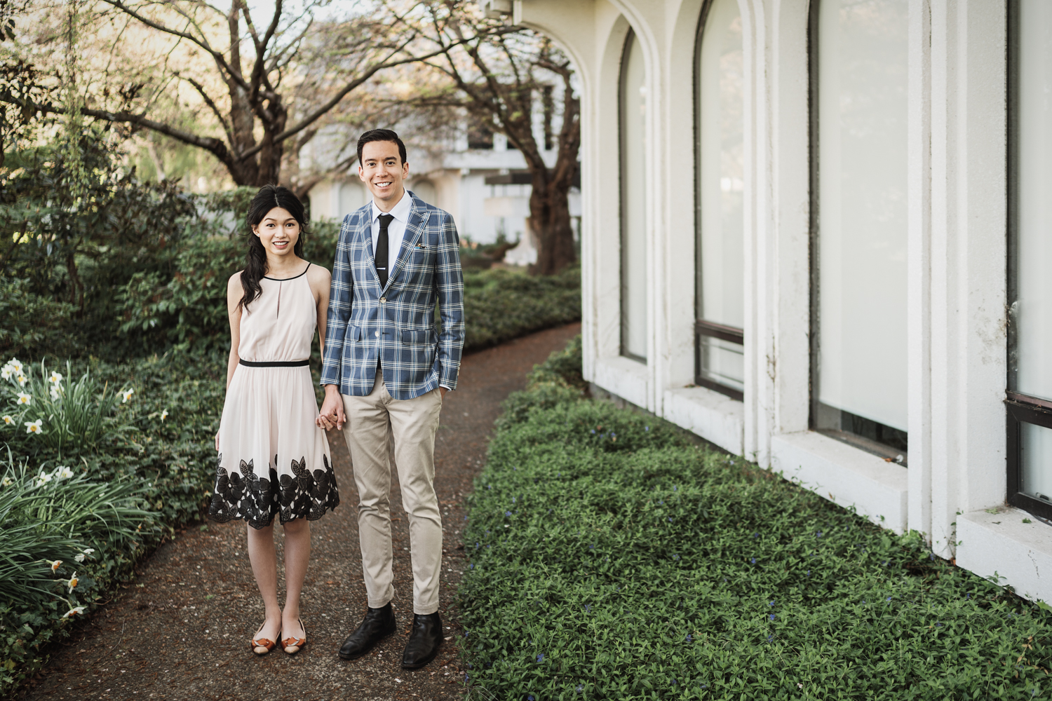 museum of vancouver engagement photography during spring cherry blossom season