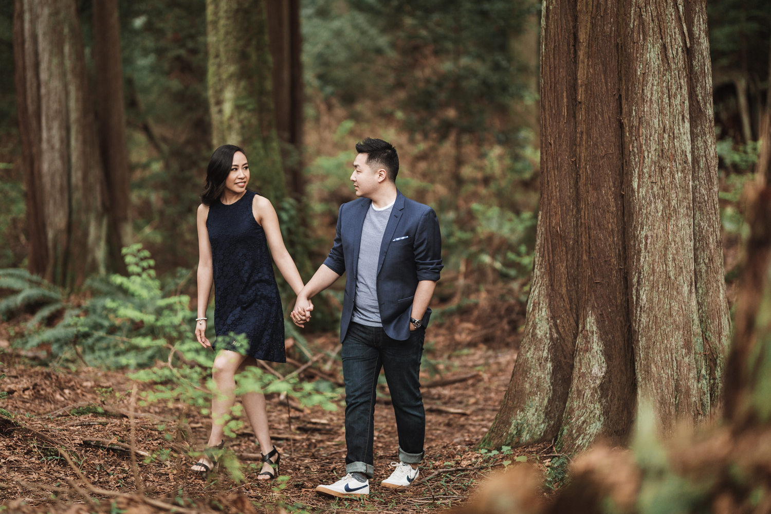 vancouver engagement photographer in stanley park during spring cherry blossom season