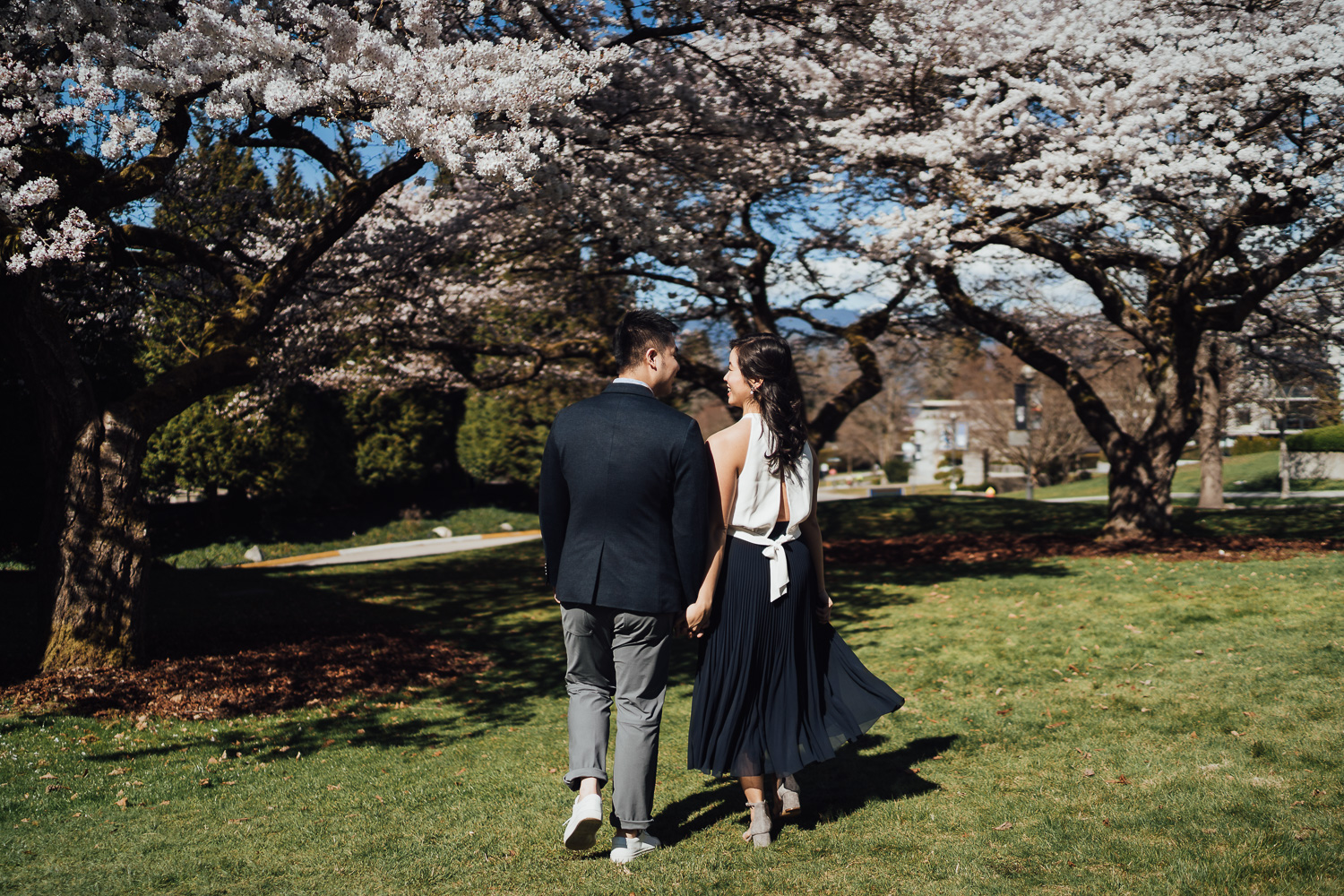 vancouver engagement photography during cherry blossom season at UBC