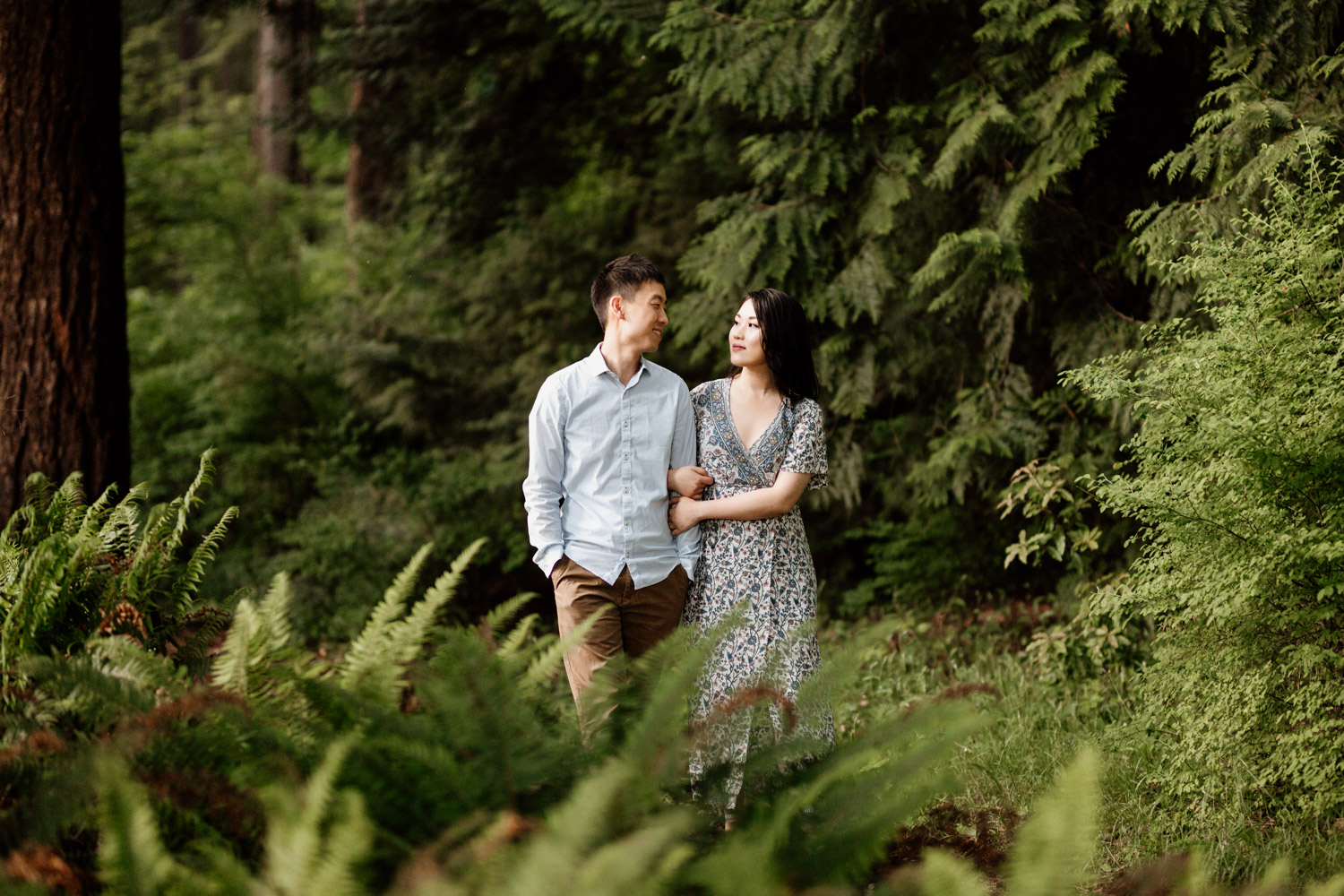 stanley park engagement photography in vancouver bc during sunset or golden hour at rose garden