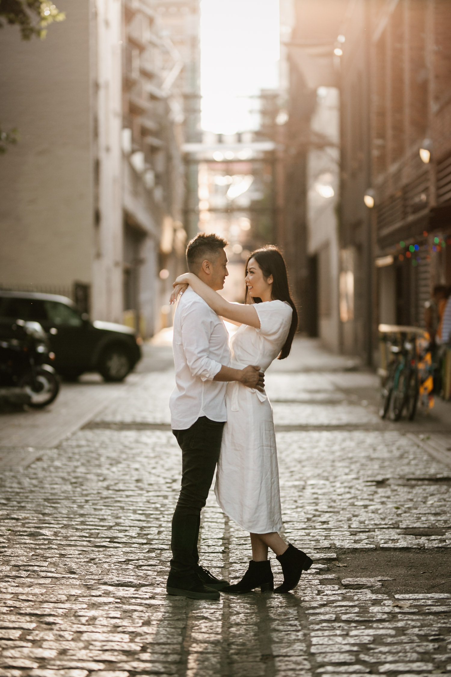 gastown engagement photography during golden hour in the summer located in vancouver bc canada