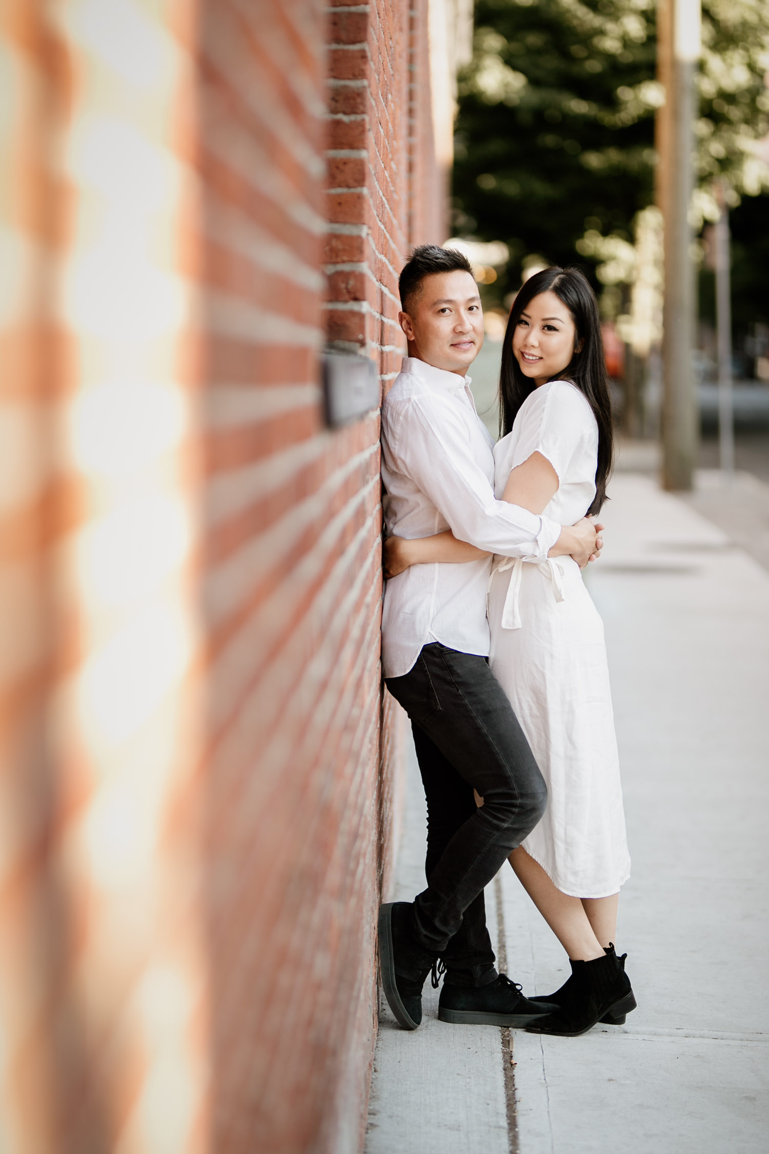 gastown engagement photography during golden hour in the summer located in vancouver bc canada